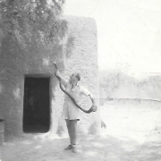 Bert (Nigeria) with His Python Outside his Kitchen